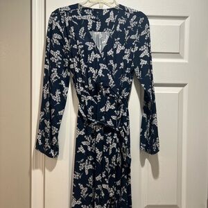 Women’s knee length blue and white dress